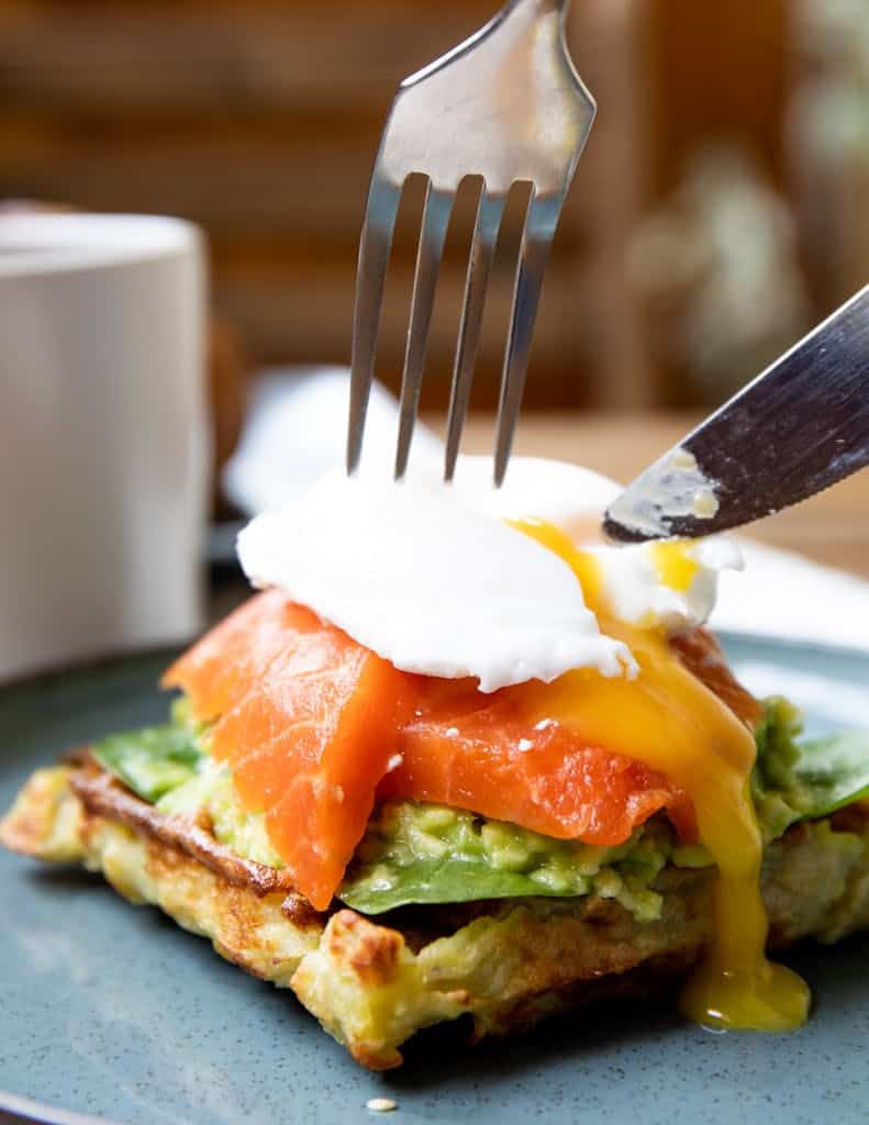 Testosterone boosting foods including salmon and whole eggs on plate