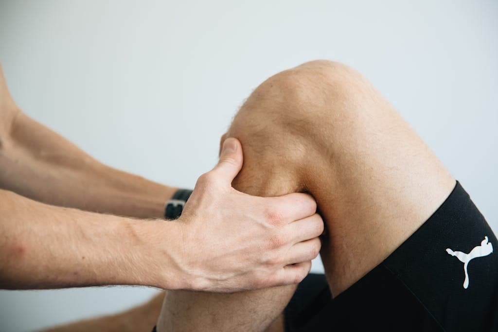 injury prevention for massage therapist, focusing on knee massage treatment.